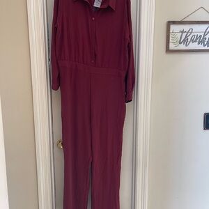 Fashion Nova Long Sleeve Button-Front Jumpsuit in Wine